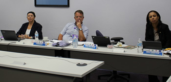 Some members of the PTRC were caught in deep thought as they deliberate over the PADs.  Photographed here representing the Governments of Canada and United Kingdom are (l-r): Ms. Jean McCardle, First Secretary (Development) and Alternate Canadian Director to the CDB along with Mr. Steven Hillier, Disaster Risk Reduction Adviser of the Department For International Development.  Also in photo is Mrs. Shelly Bradshaw, Mitigation Manager at Trinidad and Tobago’s Office of Disaster Preparedness and Management